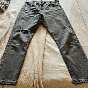 Levi’s black faded skinny jeans